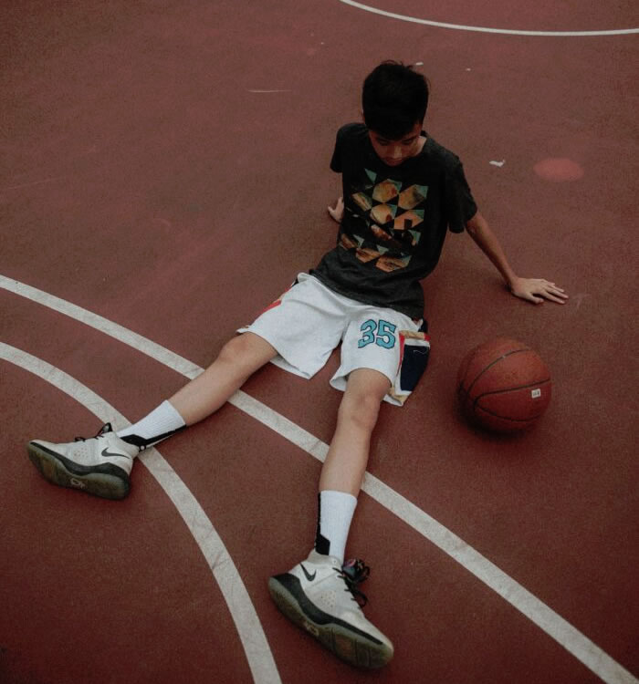 Youth on Basketball Court