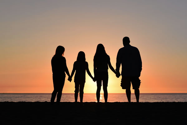 Family on the Beach at Sunset